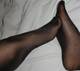 piedi in collant neri velati